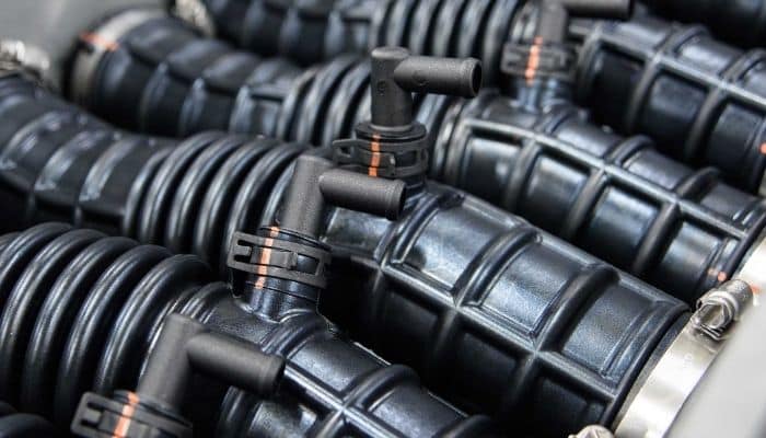 Moulded black rubber components for the automotive industry made at Avon Engineered Rubber