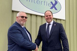 Steve Thomas (pictured right), Group Sales Director of Avon Group shaking hands with Jim Griffin, Director of Interflex