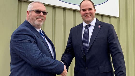 Steve Thomas (pictured right), Group Sales Director of Avon Group shaking hands with Jim Griffin, Director of Interflex